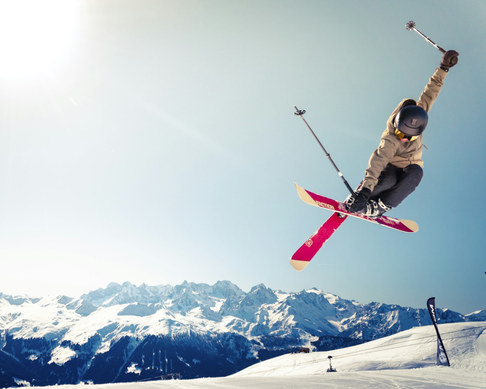 Snow-covered alpine slopes in bright light